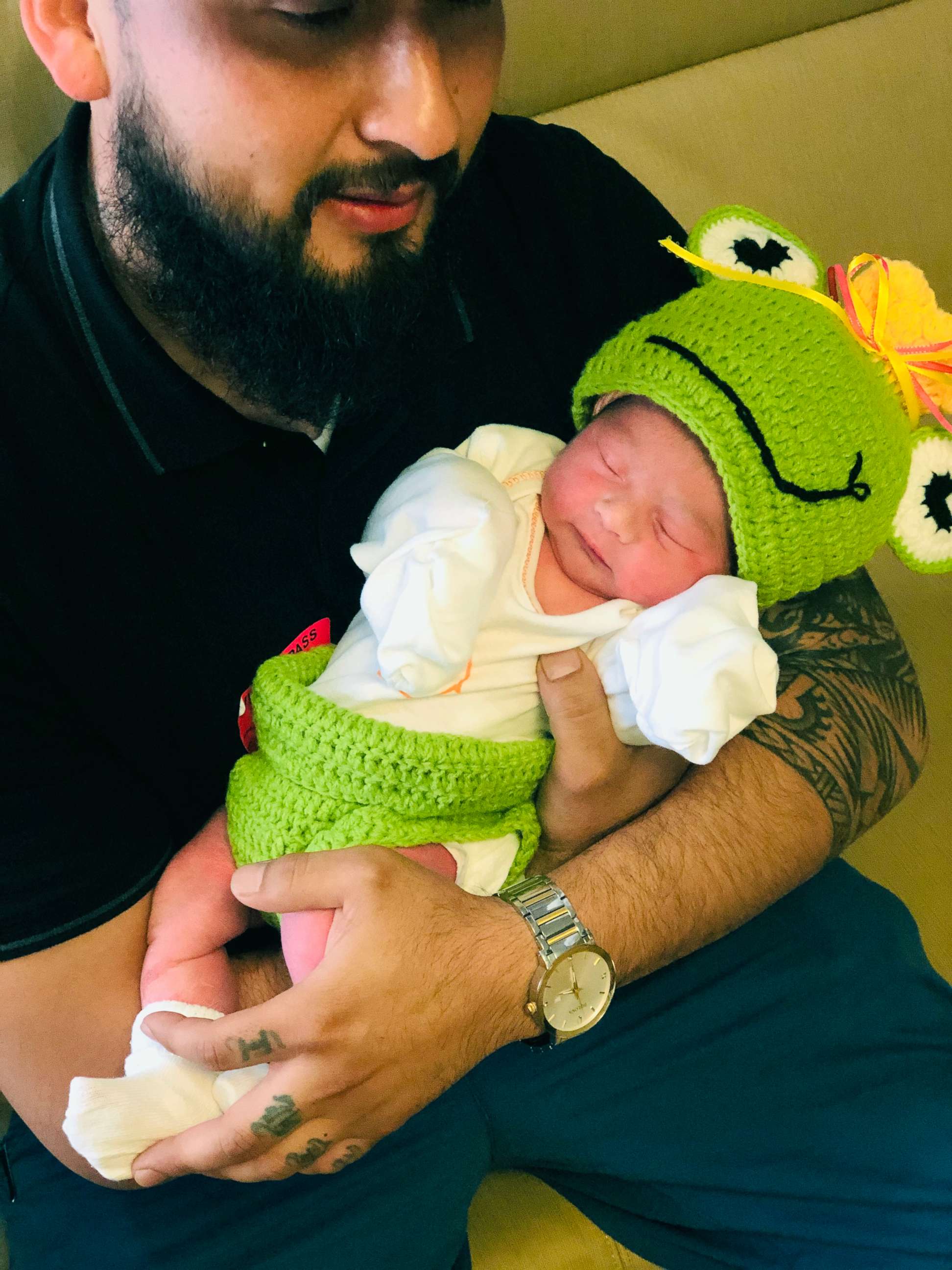 PHOTO: Ivan Penaloza, 32, a who was born on Leap Day, holds his newborn daughter, Camila, who was born Saturday, Leap Day, at San Juan Medical Center in Carmichael.