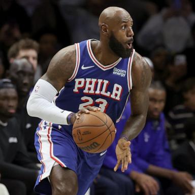 PHOTO: Philadelphia 76ers' LeBron James dribbles during the first half of a preseason NBA basketball game against the Brooklyn Nets, Oct. 8, 2026, in New York City. 