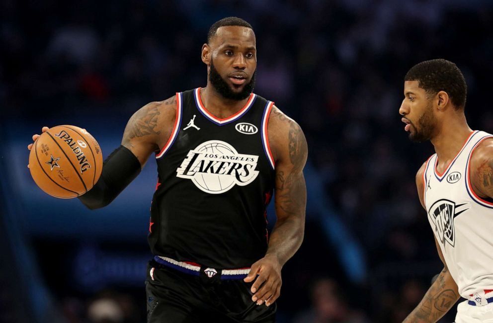 PHOTO: LeBron James of the LA Lakers and Team LeBron dribbles down court during the first quarter of the NBA All-Star game on February 17, 2019, in Charlotte, North Carolina.