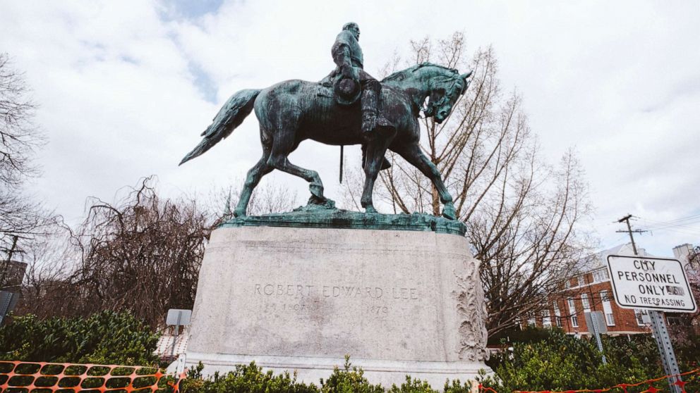PHOTO: A statue of Confederate General Robert E. Lee is seen in Market Street Park, April 1, 2021, in Charlottesville, Va. 