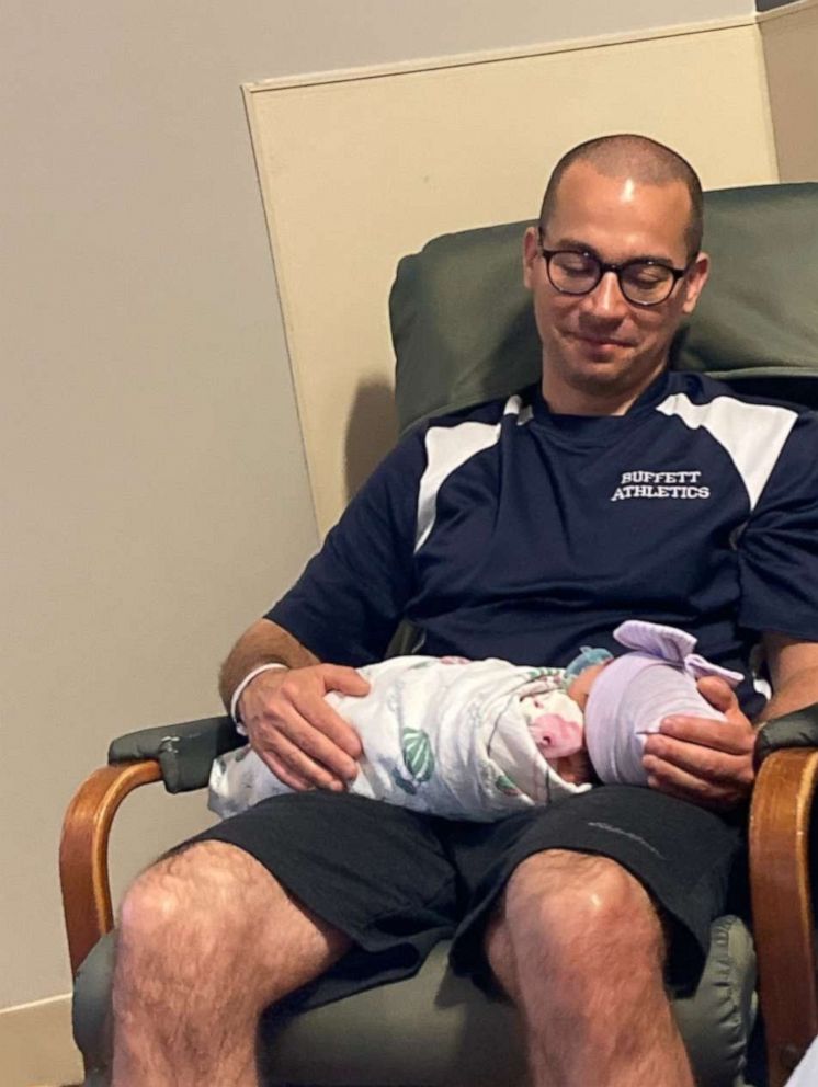 PHOTO: 2022 Nebraska Teacher of the Year Lee Perez holding his first child, his daughter Natalia, after she was born in Omaha, Nebraska.