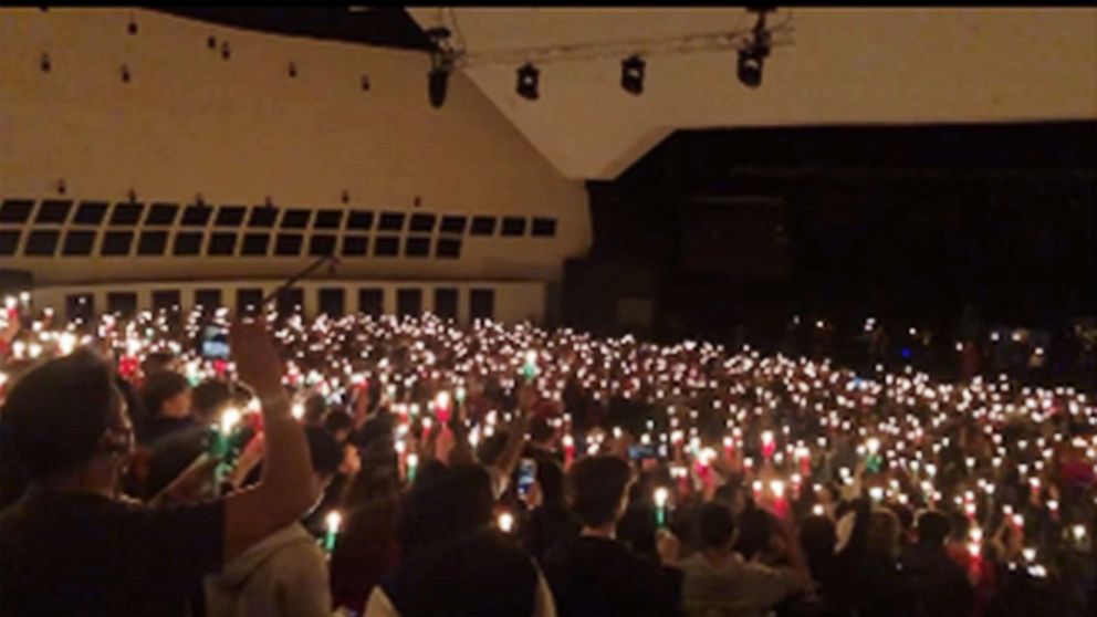 PHOTO: A social media post by the Youth Ministry of the Legacy Church in Albuquerque, New Mexico, shows a large group of patrons singing Christmas carols during a Christmas Eve gather at the Church.