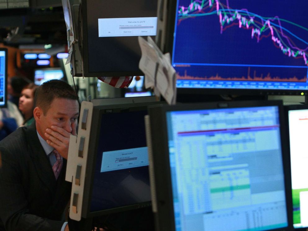 PHOTO: A trader works on the floor of the New York Stock Exchange on September 15, 2008 in New York.