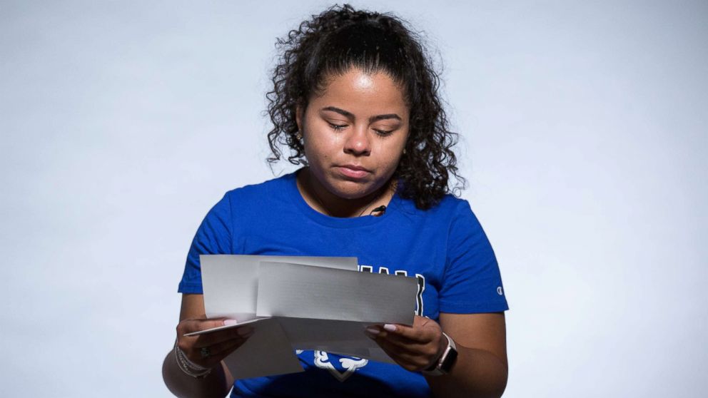 PHOTO: First generation college students read letters from their parents. Pictured: Elizabeth Rodriguez