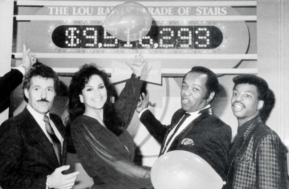 PHOTO: Alex Trebek, Jayne Kennedy, Lou Rawls and LeVar Burton participate in the seventh annual "Lou Rawls Parade of Stars" telethon in 1986.