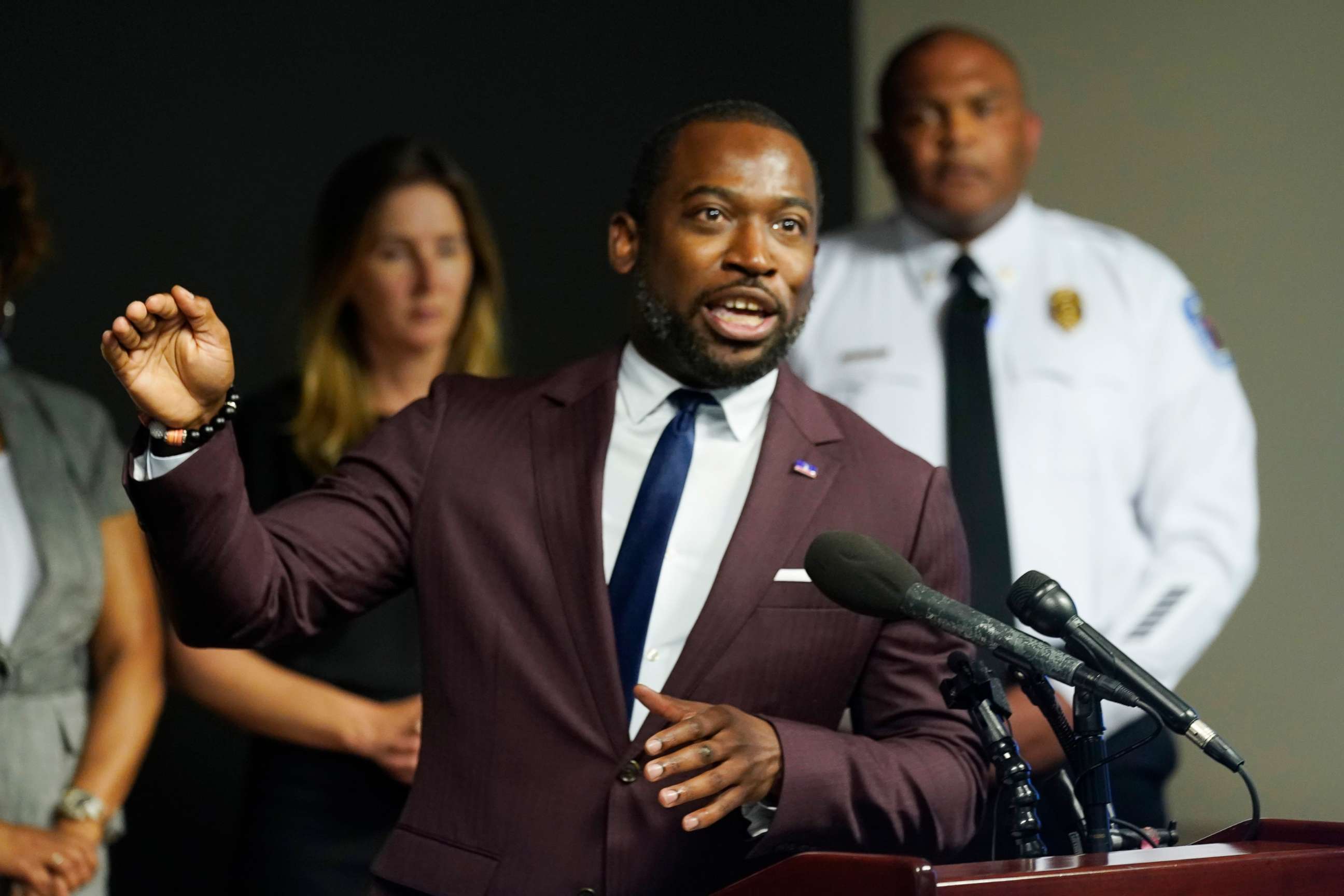 PHOTO: Richmond Mayor Levar Stoney, left, gestures while Police Chief Gerald M Smith, right, listens during a press conference at Richmond Virginia Police headquarters, July 6, 2022, in Richmond, Va.