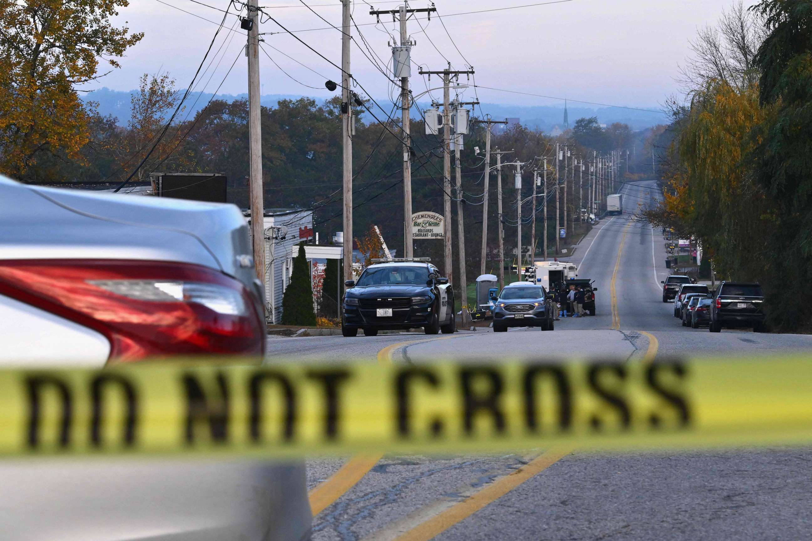 PHOTO: Police tape blocks off the street near Schemengees Bar and Grille in Lewiston, Maine, on Oct. 27, 2023.