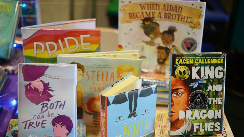 PHOTO: Children books that are fighting for survival at public schools because of their LGBTQ content are displayed at the annual Pride Town Hall at Walter Johnson High School in Bethesda, Md., May 21, 2022.