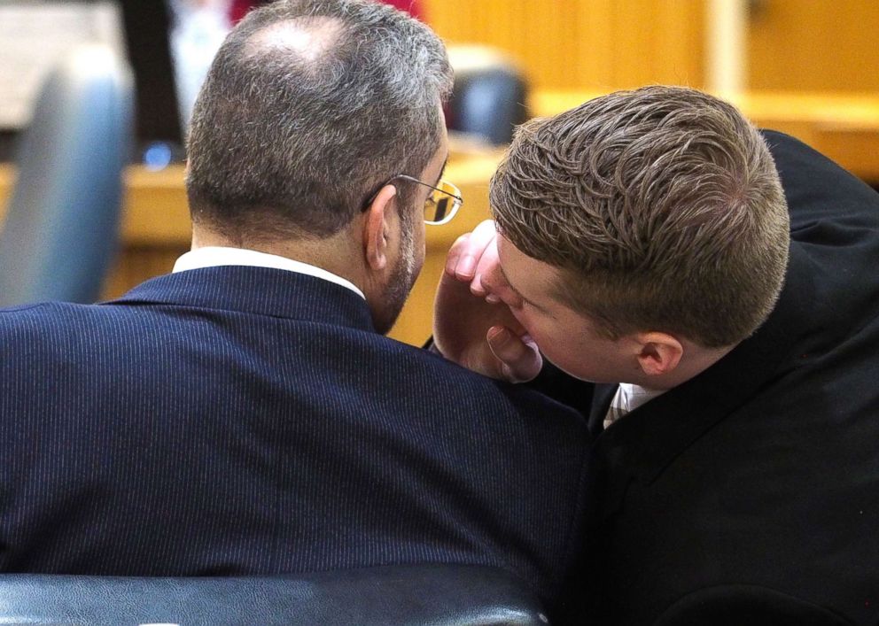 PHOTO: Defense attorney Carlos Diaz-Cobo, left, confers with his client Liam McAtasney, right, during his murder trial, Feb. 5, 2019, at the Monmouth County courthouse in Freehold, N.J.