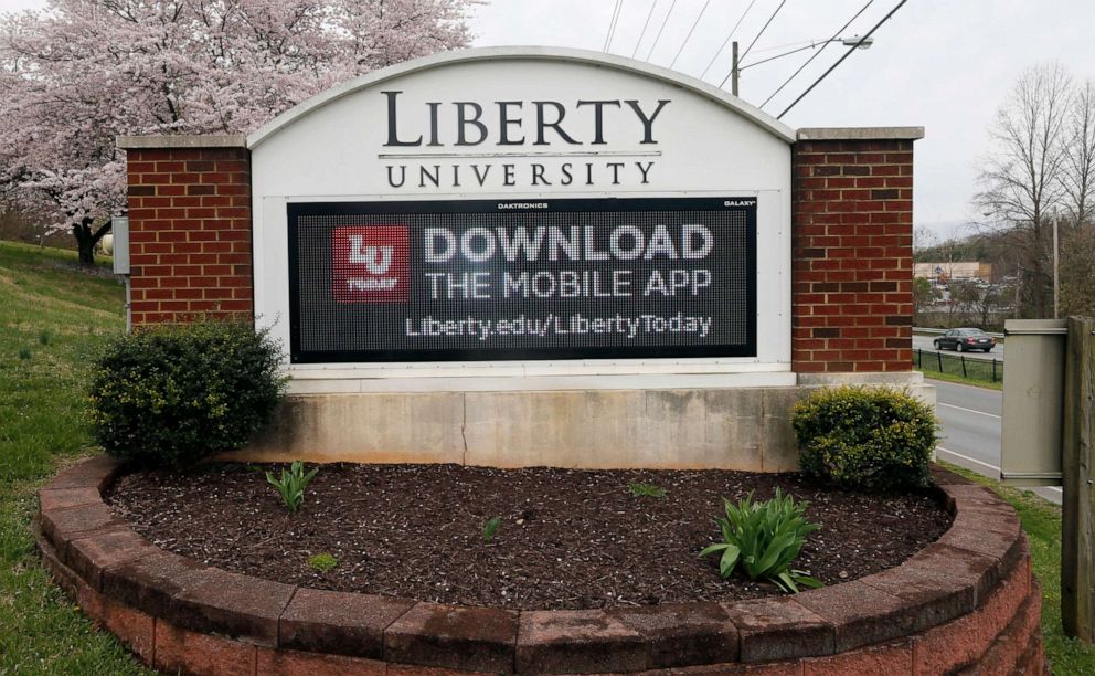 PHOTO: A sign marks the entrance to Liberty University in Lynchburg, Va., March 24 , 2020. 