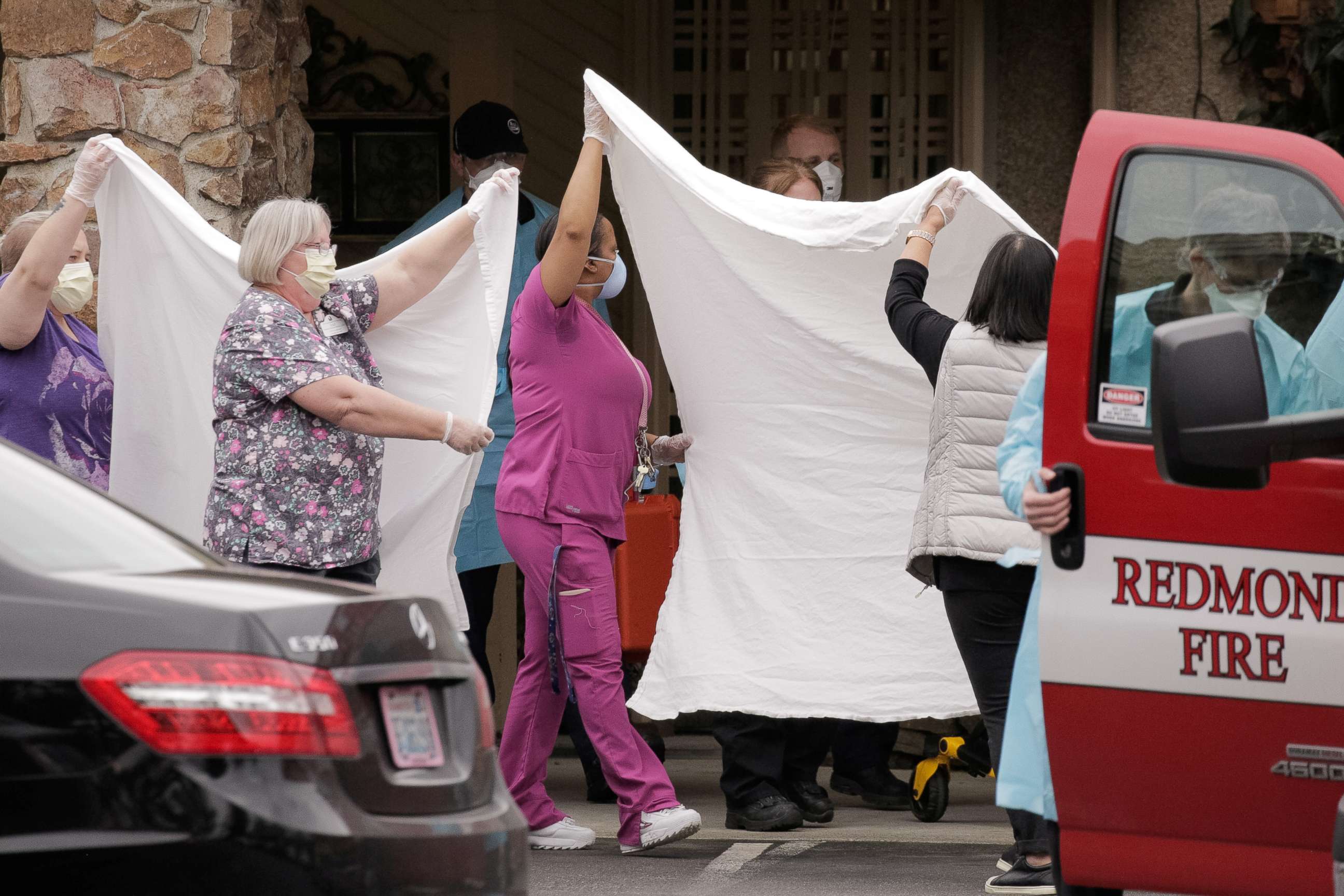 PHOTO: Health workers transfer a patient on a stretcher to an ambulance at the Life Care Center of Kirkland, the long-term care facility linked to several confirmed coronavirus cases in the U.S. state, in Kirkland, Washington, March 1, 2020.