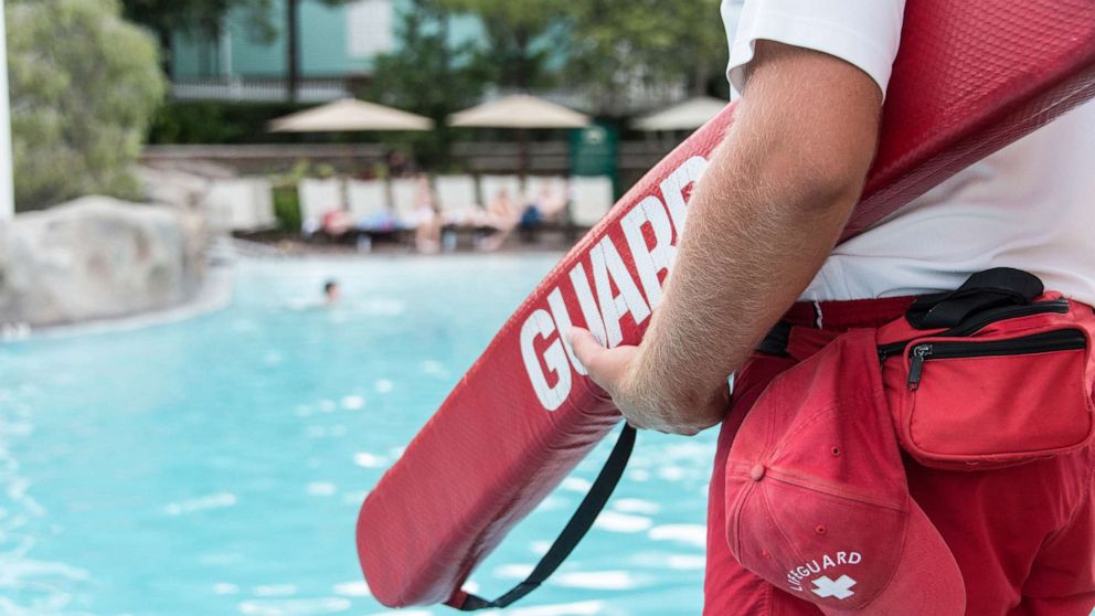 PHOTO: A lifeguard watches a swimming pool in an undated stock photo.