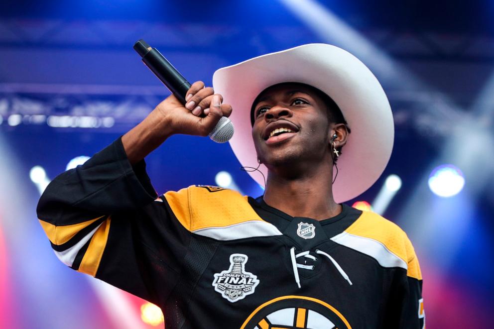 PHOTO: In this May 27, 2019 file photo, Lil Nas X performs his hit single "Old Town Road" during the 2019 Stanley Cup Final Party at Boston's City Hall Plaza in Boston.