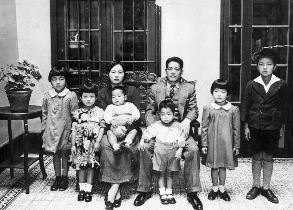 PHOTO: Art's family home in Lima, Peru, on Calle Santa Catalina. (L to R): Fusako, Akiko, Mother carrying Takeshi, Kenichi, Father, Kikue, Isamu (Art), 1939.