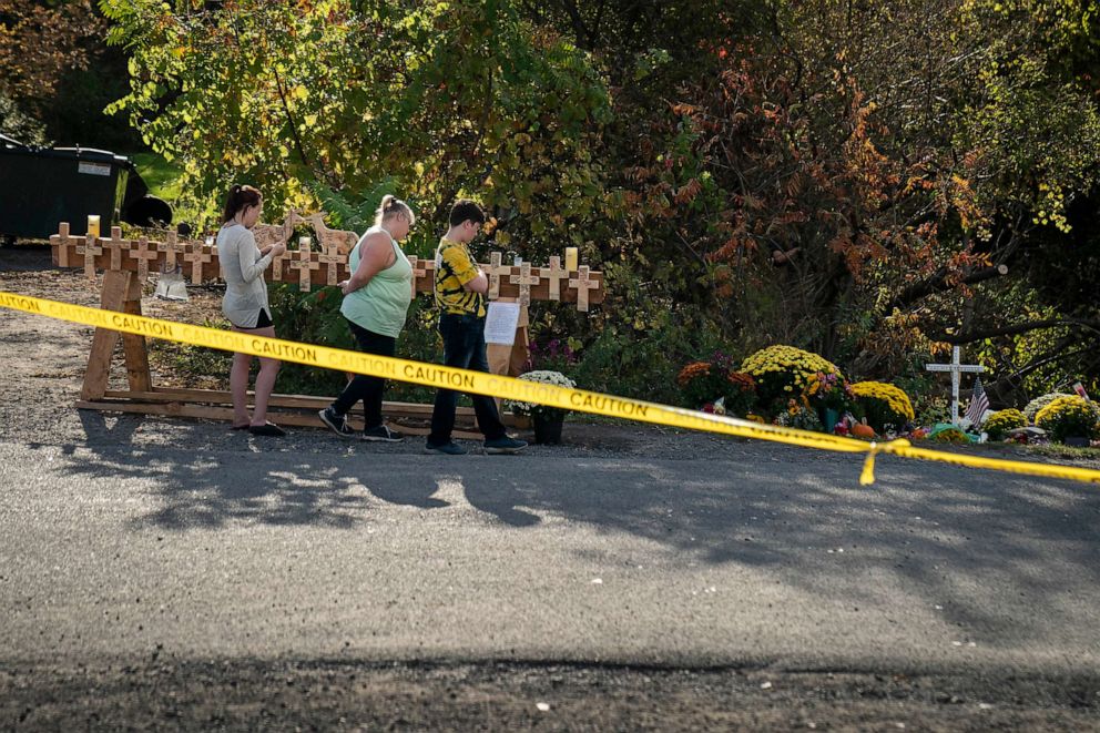 PHOTO: Mourners visit the site of a fatal limousine crash that killed 20 people near the intersection of Route 30 South and Route 30A, Oct. 10, 2018, in Schoharie, N.Y.