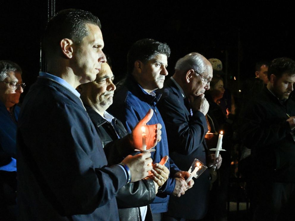 New York Assembly member Angelo Santabarbara, Mayor of Amsterdam, Michael Villa, New York State Senator George A. Amedore, and New York Congressman York, Paul Tonko, gather for a memorial at the Mohawk Valley Gateway Gateway Overlook, in New York, on Monday, October 8, 2018.