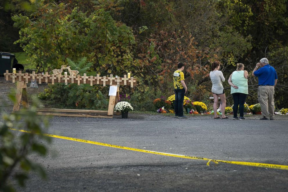 PHOTO: Mourners visit the site of a fatal limousine crash that killed 20 people near the intersection of Route 30 South and Route 30A, Oct. 10, 2018 in Schoharie, New York.