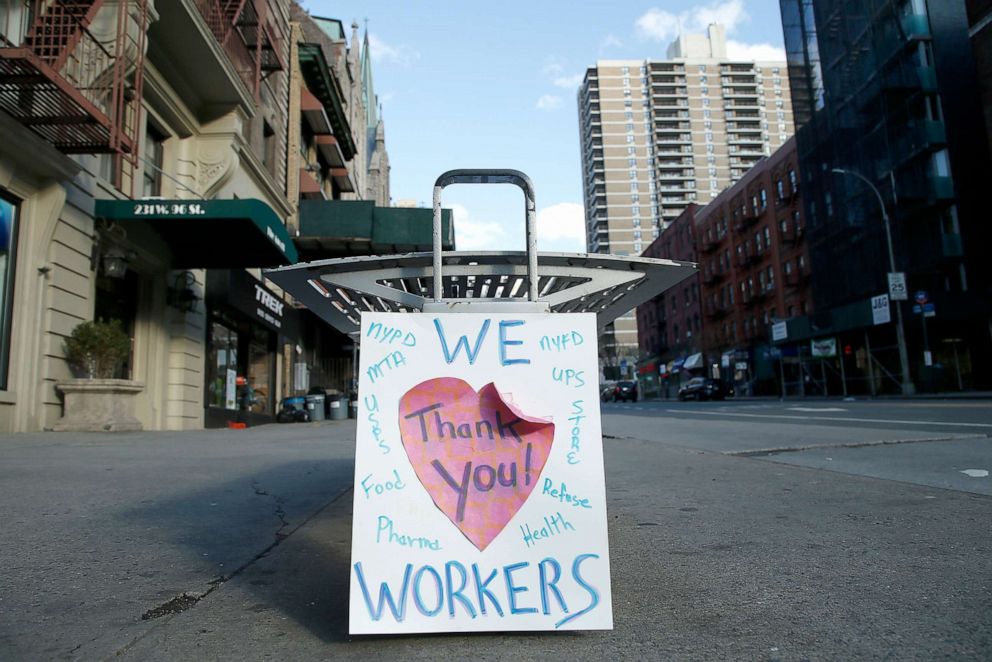 PHOTO: A thank you sign adressed to health care workers is propped next to a bench in New York, April 6, 2020.