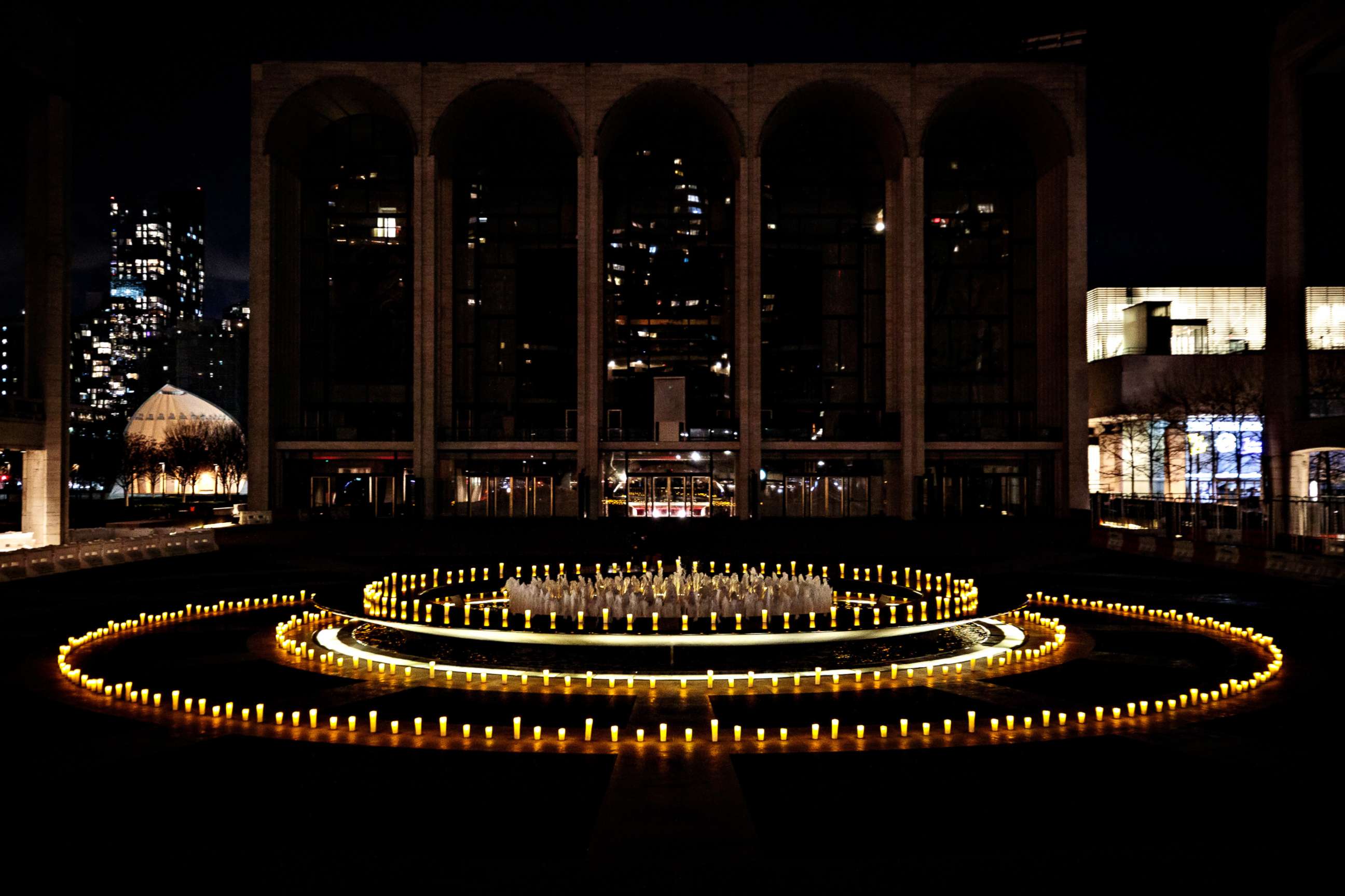 PHOTO: Lincoln Center illuminated their iconic fountain to offer a memorial for New York City’s COVID-19 victims on March 14, 2021.