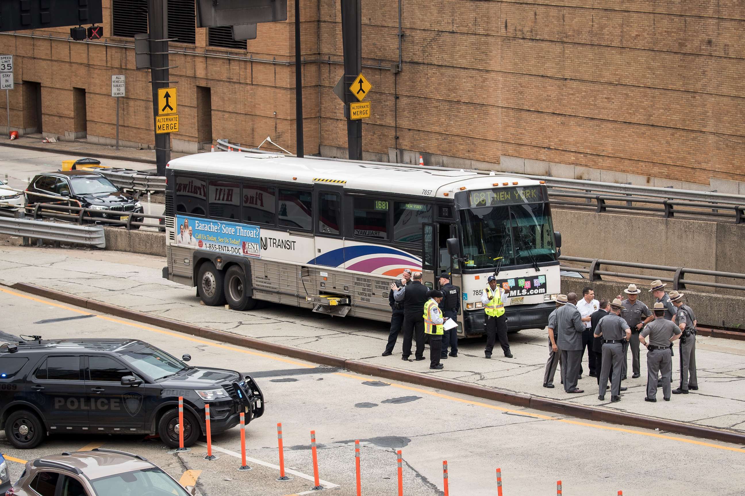 PHOTO: Law enforcement officials investigate a New Jersey Transit bus that was involved in a morning crash near the Manhattan entrance to the Lincoln Tunnel, May 18, 2018 in New York.