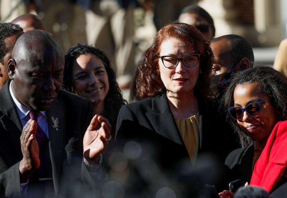 PHOTO: Prosecutor Linda Dunikoski, next to attorney Ben Crumps and prosecutor Larissa Ollivierre, looks on outside the Glynn County Courthouse after the jury reached a guilty verdict in Brunswick, Ga., Nov. 24, 2021.