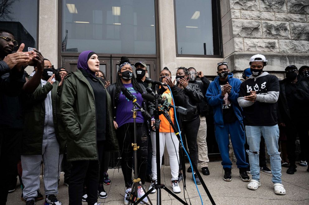 PHOTO: Linda Sarsour of Until Freedom speaks while surrounded by Breonna Taylor's Family, members of Until Freedom, and local protesters during a press conference held in front of Commonwealth Attorney Tom Wine's office on March 11, 2021, in Louisville.