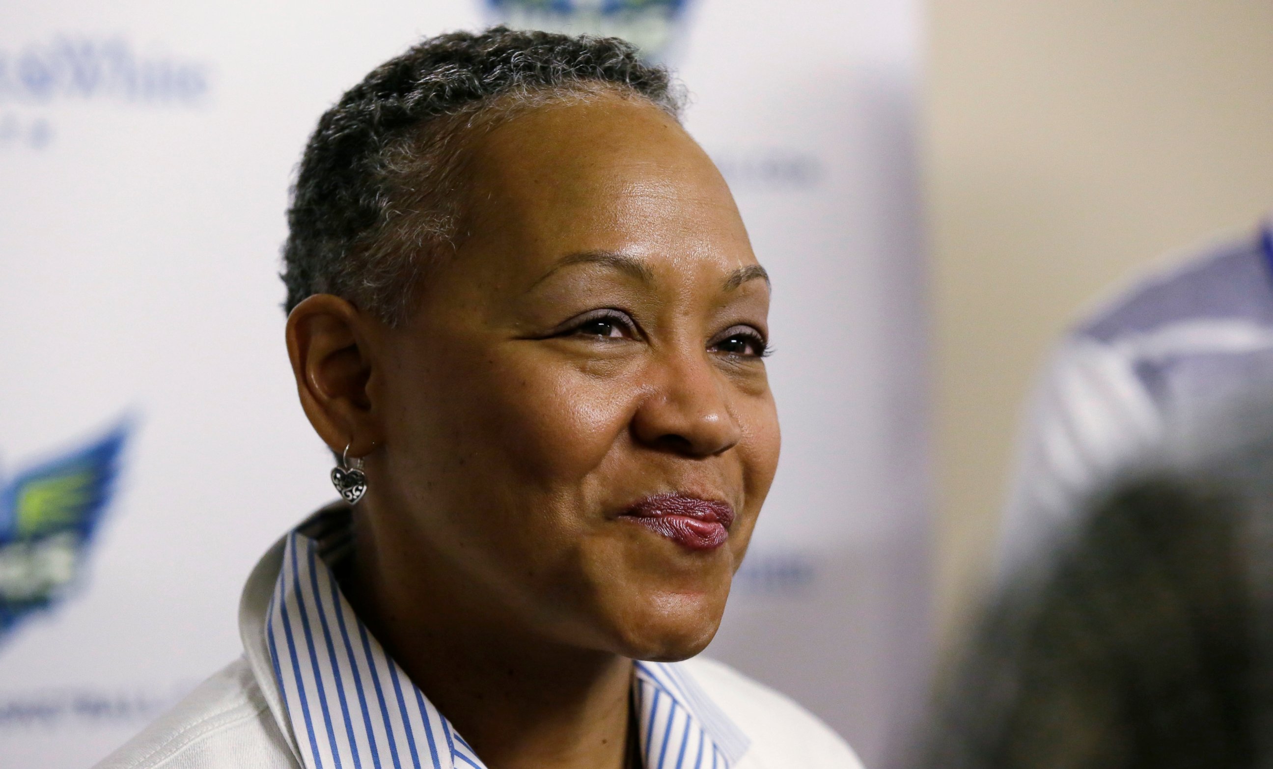 PHOTO: In this May 21, 2016, file photo, WNBA President Lisa Borders smiles as she speaks to reporters before a WNBA basketball game between the San Antonio Stars and the Dallas Wings in Arlington, Texas. 