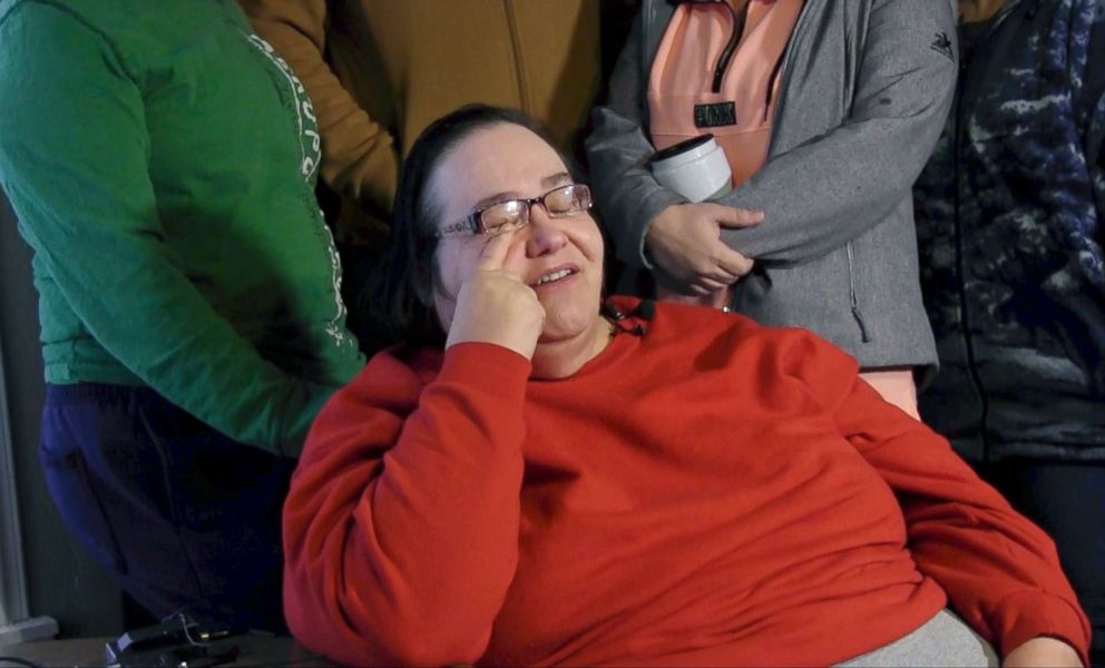 PHOTO: Lisa Finch, surrounded by family members reacts to the killing of her son Andrew Finch after he was shot  by police, in Wichita, Kan., Dec. 29, 2017.