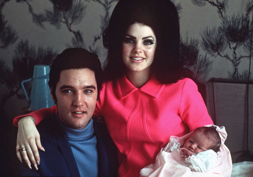 PHOTO: Elvis Presley poses with wife Priscilla and daughter Lisa Marie, in a room at Baptist hospital in Memphis, Tenn., on Feb. 5, 1968.