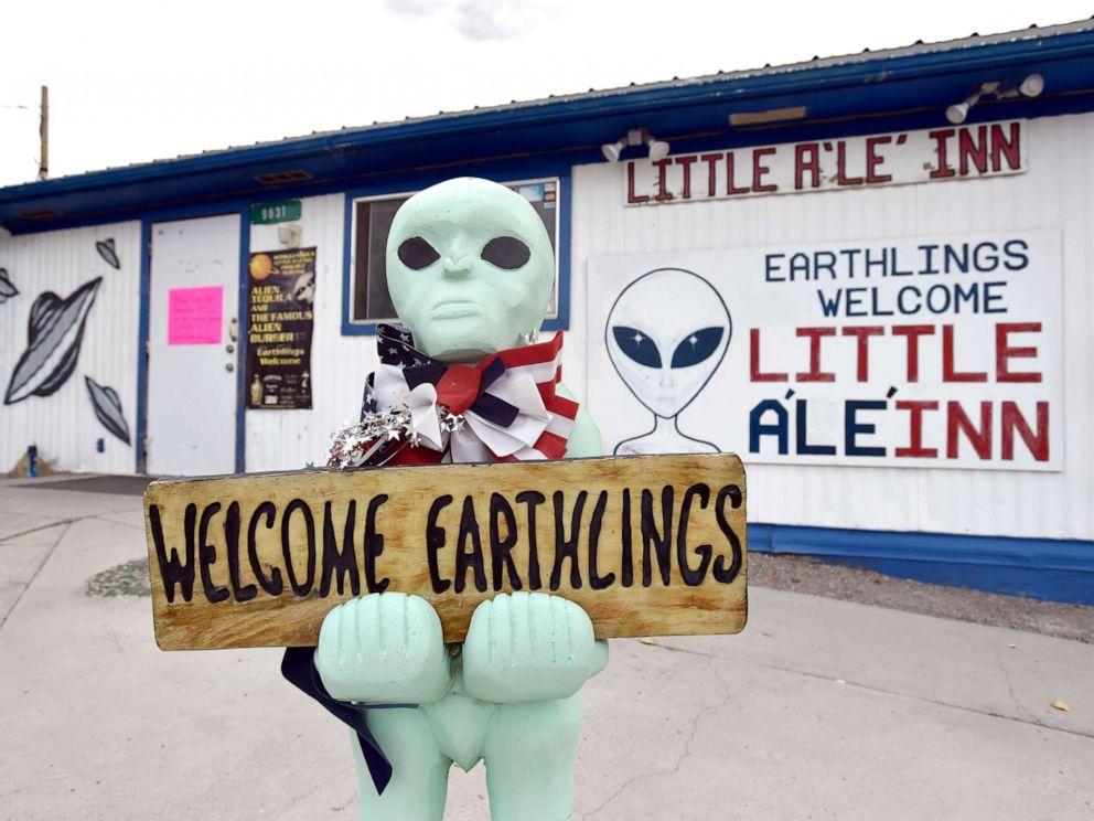 PHOTO: An alien-like statue displays a sign welcoming guests to the Little Ale Inn restaurant and gift shop, July 22, 2019, in Rachel, Nevada.