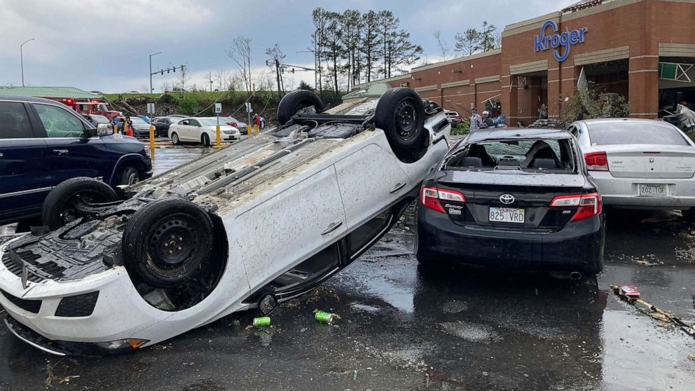 PHOTO: A car is upturned in a Kroger parking lot after a tornado swept through Little Rock, Ark., March 31, 2023.