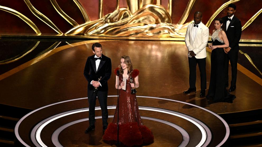 PHOTO: Dutch filmmaker Victoria Warmerdam (R) and US filmmaker Trent accept the award for Best Live Action Short Film for "I'm Not a Robot" onstage during the 97th Annual Academy Awards at the Dolby Theatre in Hollywood, Calif., on March 2, 2025.