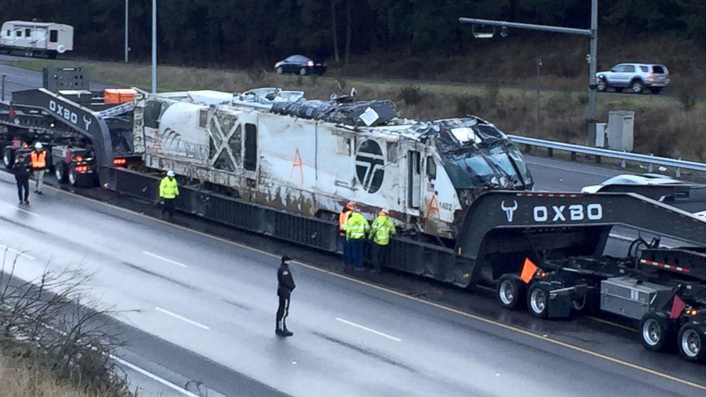 The 270,000 pound Amtak locomotive being moved from the crash site, December 20, 2017.  