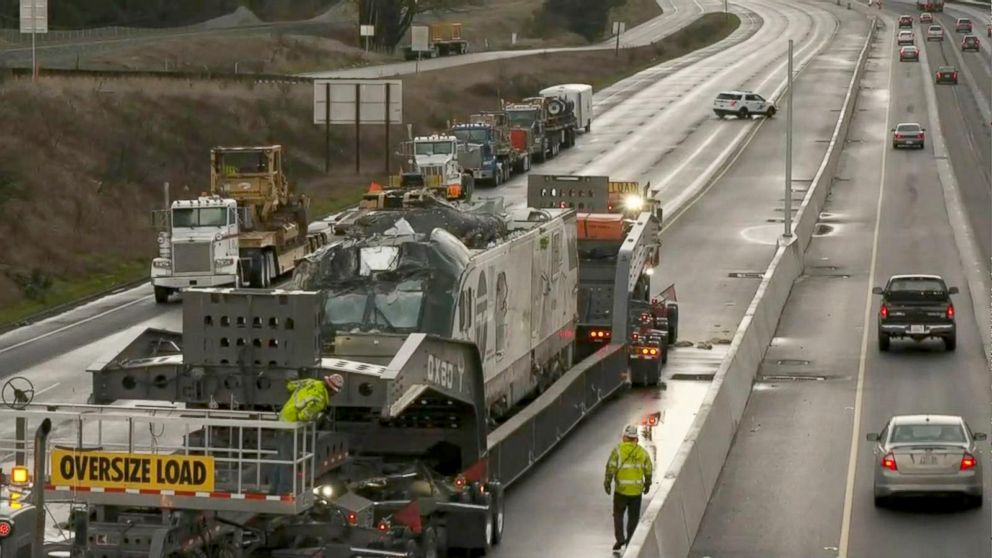 PHOTO: The 270,000 pound Amtrak locomotive being moved from the crash site, December 20, 2017.