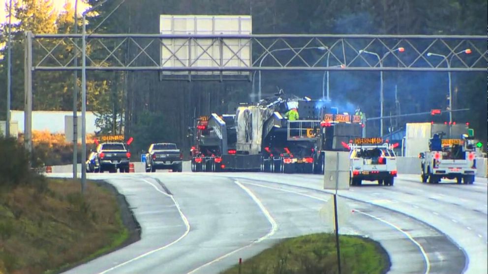 PHOTO: The 270,000 pound Amtrak locomotive being moved from the crash site, December 20, 2017.