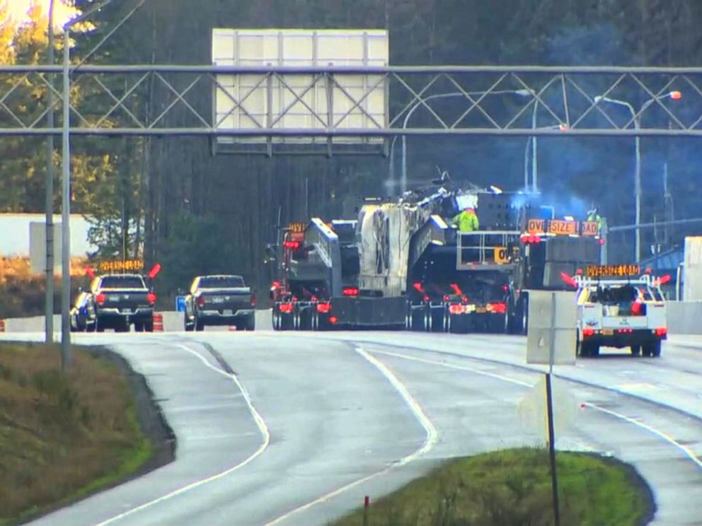 PHOTO: The 270,000 pound Amtrak locomotive being moved from the crash site, December 20, 2017.