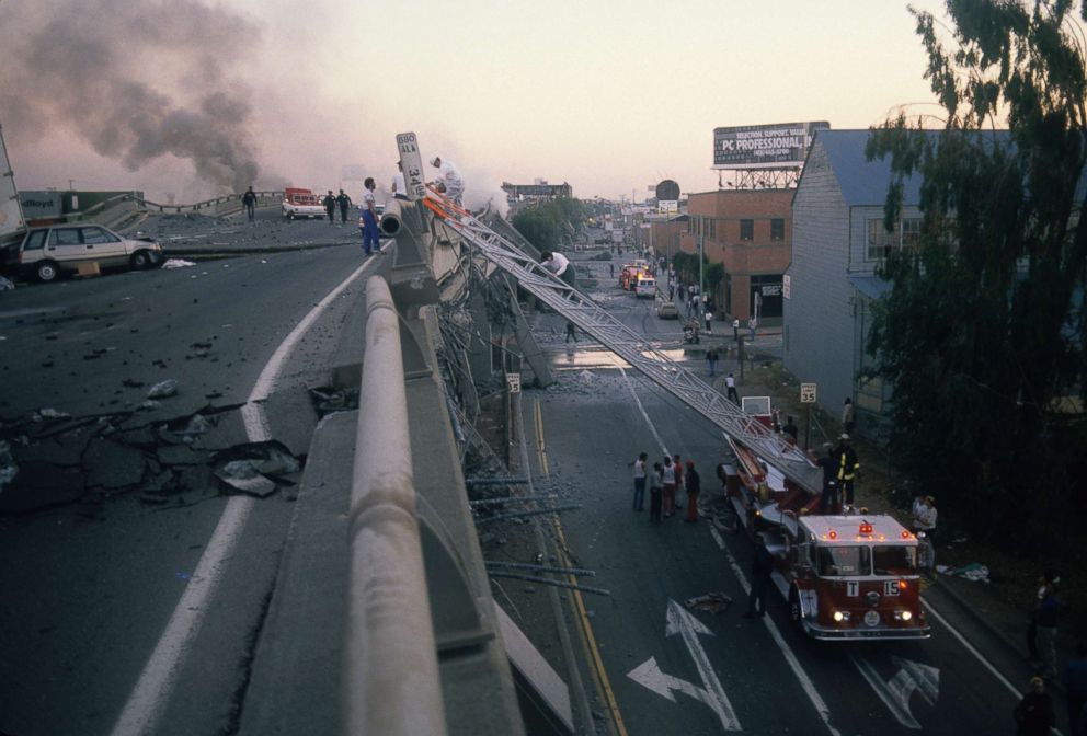 PHOTO: Rescue workers on the scene of a highway that collapsed during the Loma Prieta earthquake, Oct. 17, 1989.