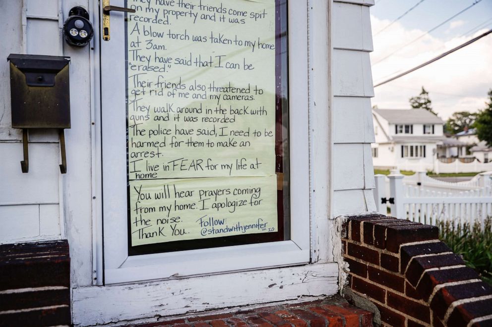 PHOTO: A sign taped the to the front door of the home of Jennifer McLegggan, who is Black and says she fears for her life due to racial animus in her neighborhood, July 13, 2020, in Valley Stream, N.Y.