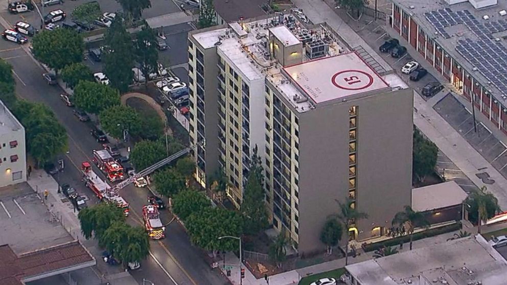 PHOTO: Emergency personnel at the scene of a shooting at a Long Beach, California retirement home where two firefighters were shot when a gunman opened fire on them, June 25, 2018.