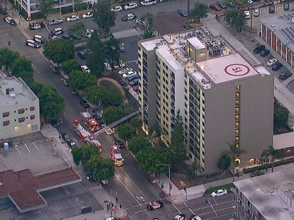 PHOTO: Emergency personnel at the scene of a shooting at a Long Beach, California retirement home where two firefighters were shot when a gunman opened fire on them, June 25, 2018.