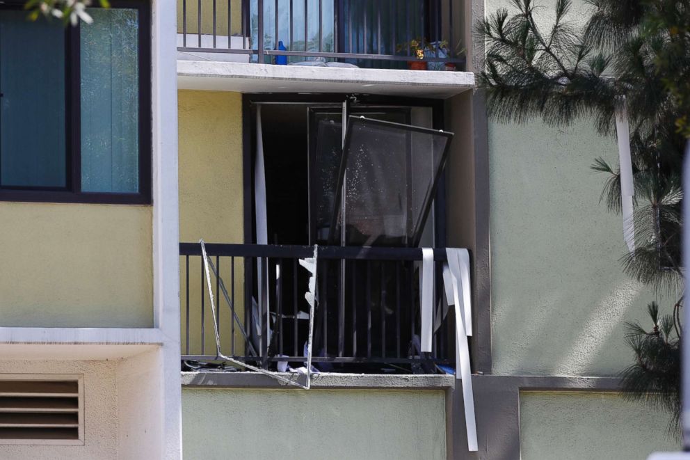   PHOTO: A broken window in a retirement home on the scene of a deadly shootout in Long Beach, California on June 25, 2018. 