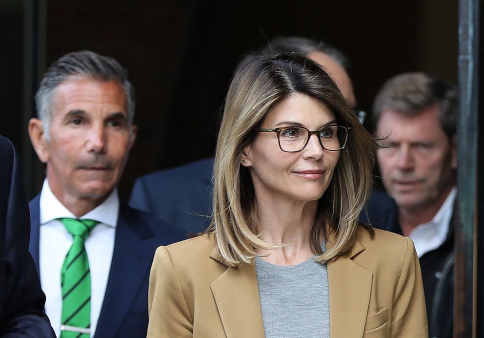 PHOTO: Lori Loughlin and her husband Mossimo Giannulli, leave the John Joseph Moakley United States Courthouse in Boston, April 3, 2019.