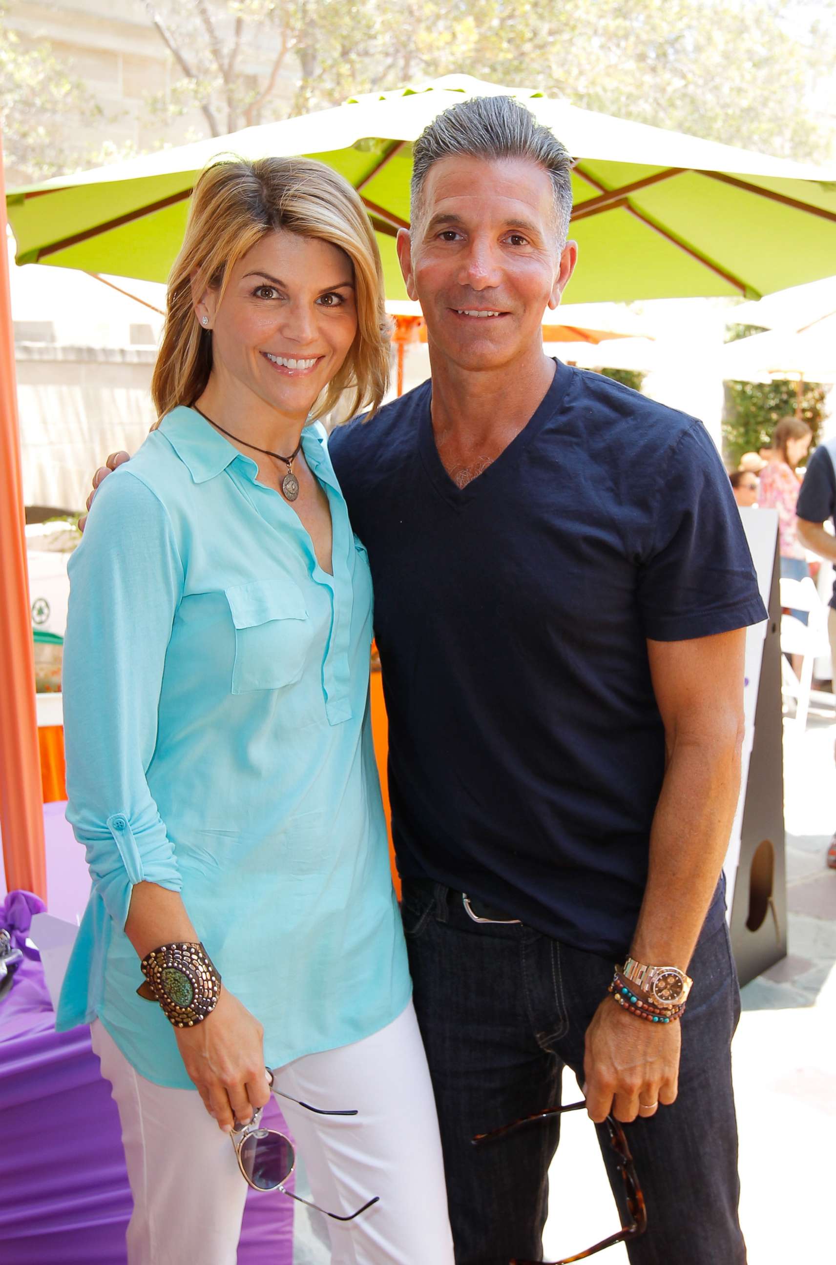 PHOTO:Lori Loughlin and Mossimo Giannulli attend the 6th Annual Kidstock Music And Arts Festival, June 3, 2012, in Beverly Hills, Calif. 