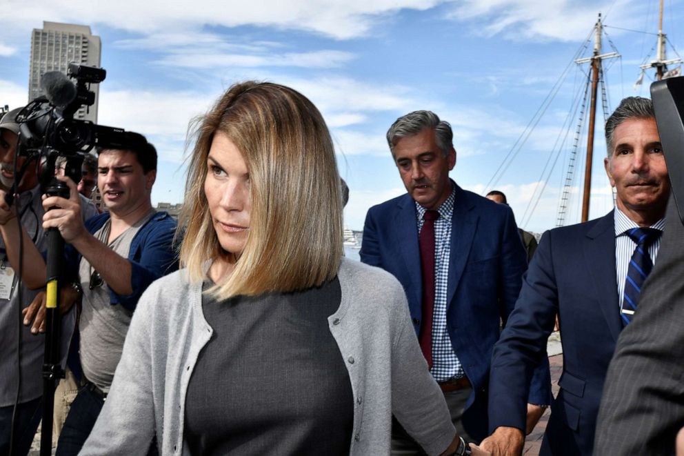 PHOTO: In this Aug. 27. 2019, file photo, Lori Loughlin, and her husband, fashion designer Mossimo Giannulli leave the federal courthouse after a hearing on charges in a nationwide college admissions cheating scheme in Boston.