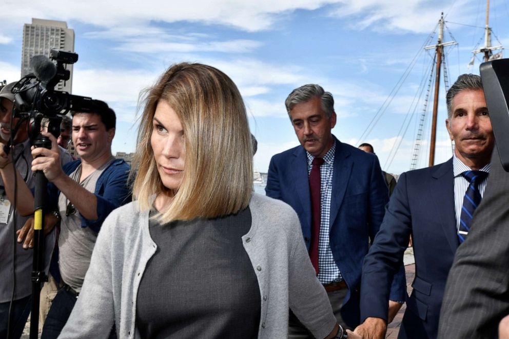 PHOTO: Lori Loughlin, and her husband, fashion designer Mossimo Giannulli leave the federal courthouse after a hearing on charges in a nationwide college admissions cheating scheme in Boston, Aug. 27, 2019.