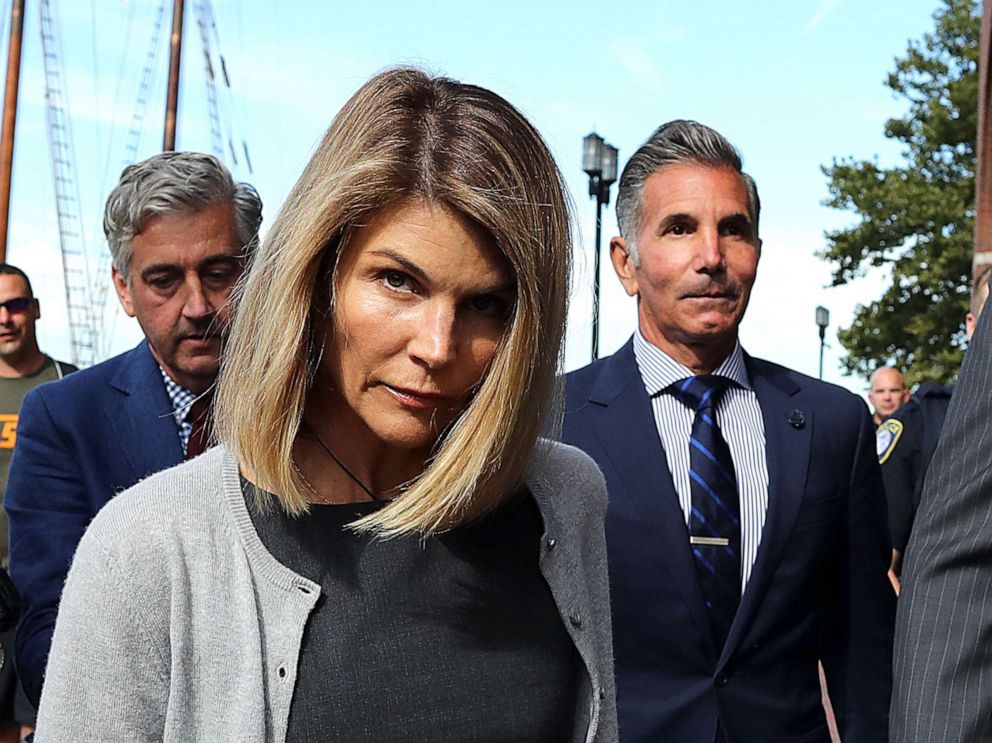 PHOTO: BLori Loughlin and her husband Mossimo Giannulli, right, leave the John Joseph Moakley Courthouse in Boston, Aug. 27, 2019.