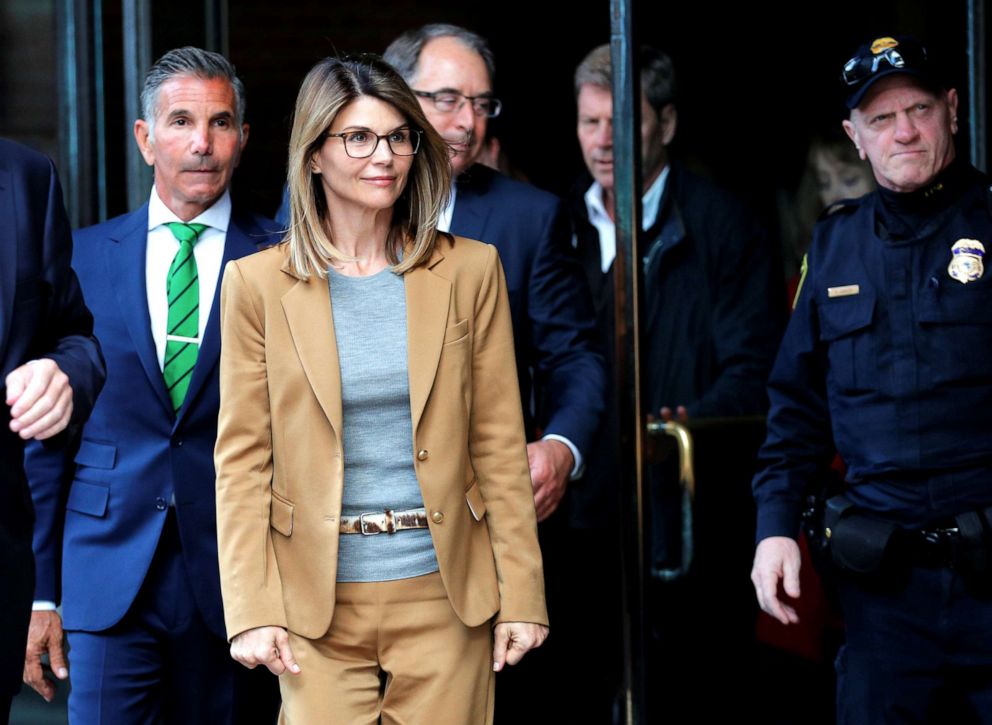 PHOTO: Lori Loughlin, and husband Mossimo Giannulli facing charges in a nationwide college admissions cheating scheme, leave federal court in Boston, April 3, 2019.