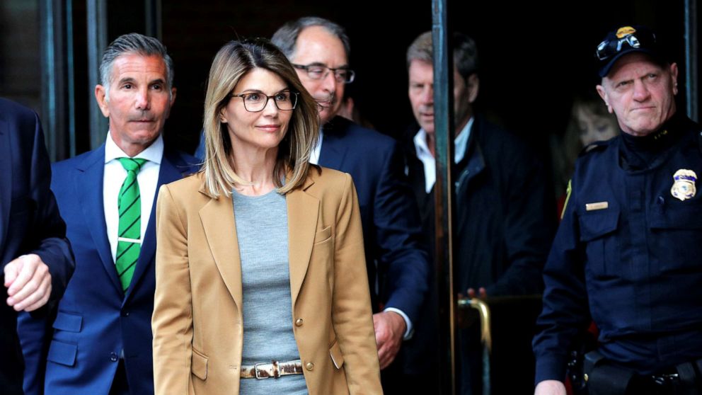 Actress Lori Loughlin, her husband and 14 other parents ensnared in a massive college entrance scam were hit with additional charges on Tuesday.