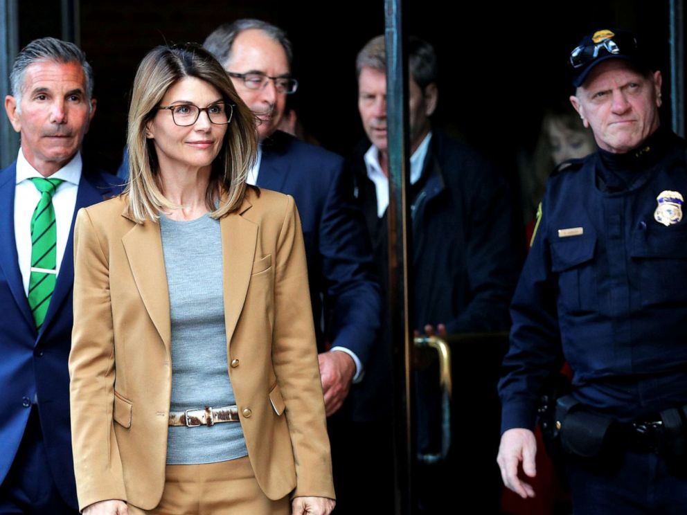 PHOTO: Lori Loughlin, and husband Mossimo Giannulli facing charges in a nationwide college admissions cheating scheme, leave federal court in Boston, April 3, 2019.
