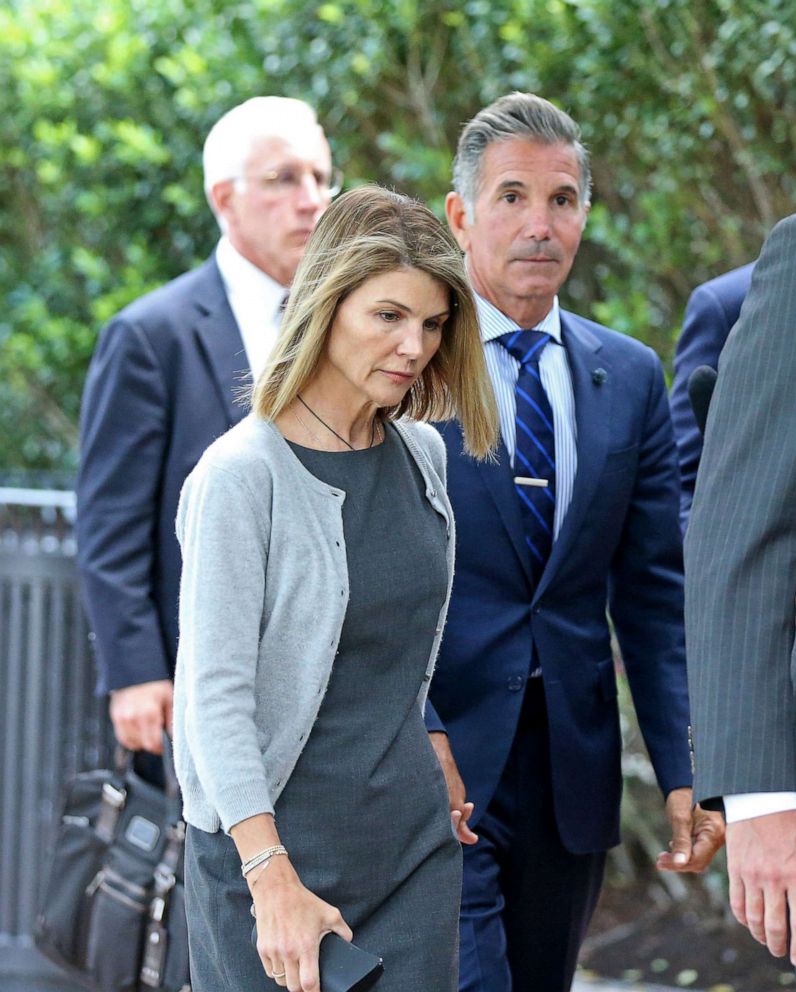 PHOTO: Lori Loughlin and her husband Mossimo Giannulli leave Moakley Federal Courthouse after a brief hearing in Boston, Aug. 27, 2019.